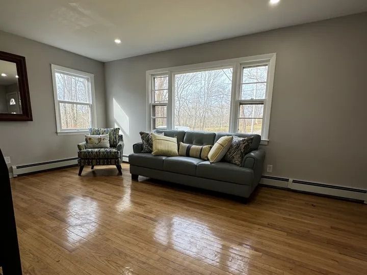 Living room of a Connecticut Cape-style home — selling a parent's house under a power of attorney or conservatorship